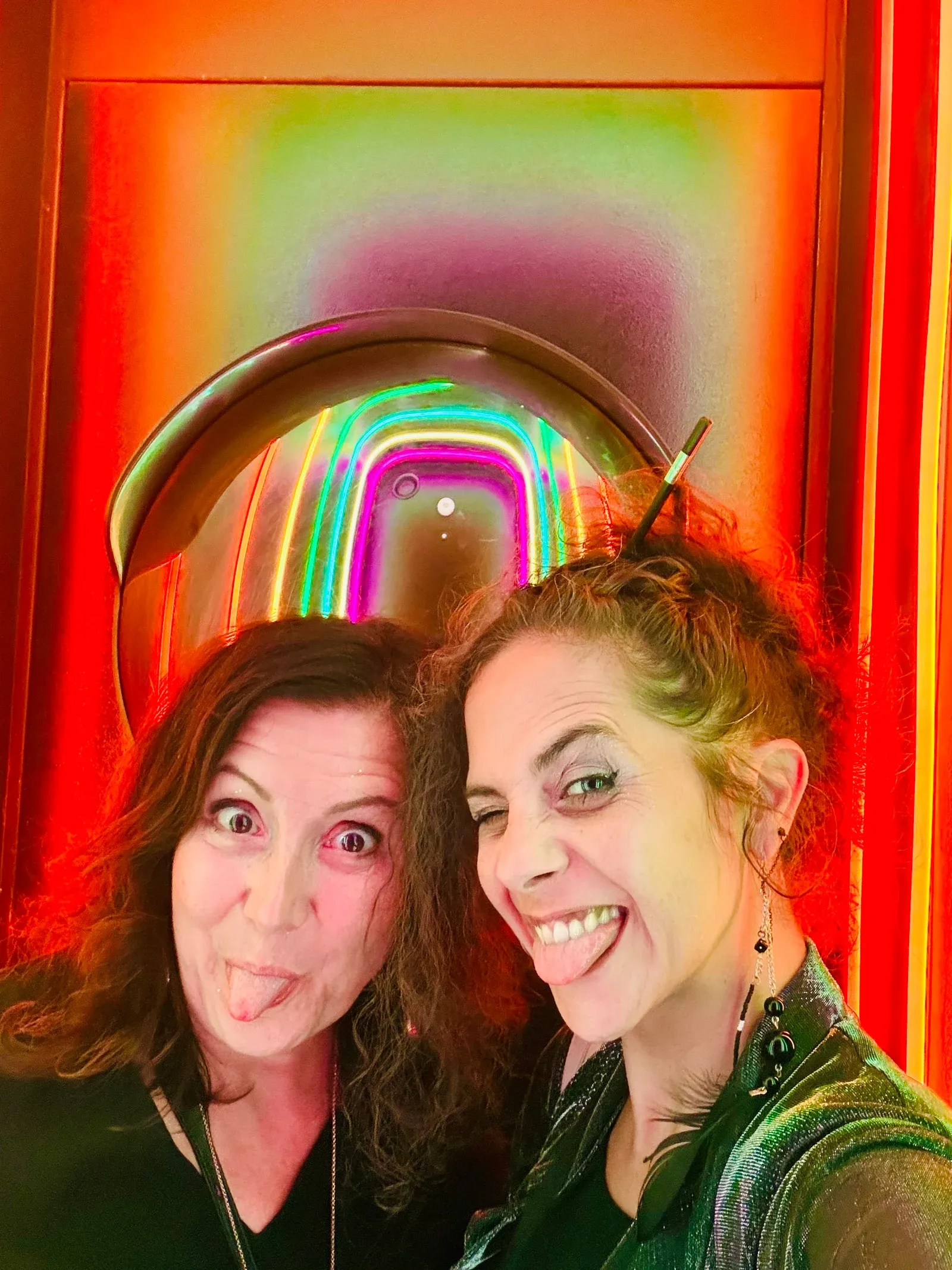 Estelle and Harmonie pulling faces together at the VO Social