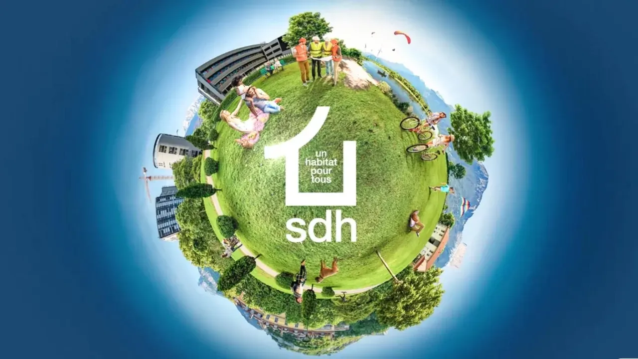 Petite planète verte habitée, logo SDH « un habitat pour tous » au centre