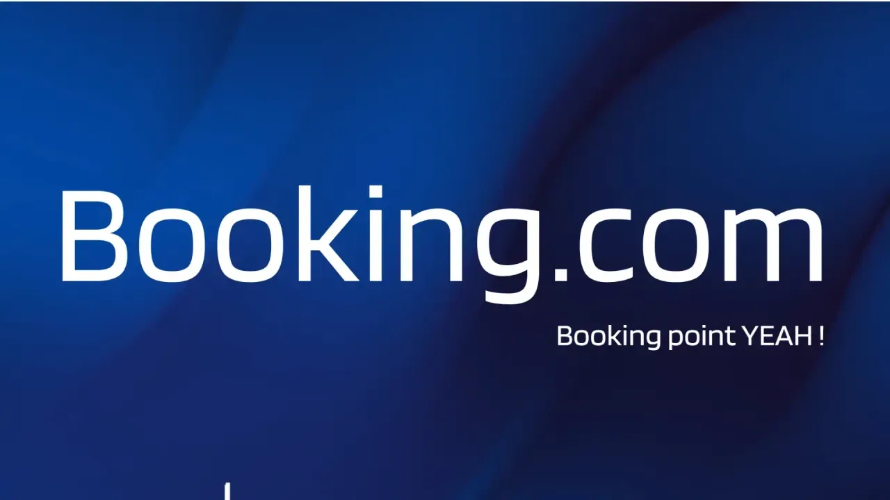 Logo Booking.com sur fond bleu et la signature « Booking point YEAH ! »